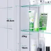 Interior view of a bathroom cabinet showing shelves with cosmetic products and measurement indicators. Produktbild-Vorschau