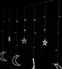 A string of decorative lights featuring crescent moons and stars against a black background. Náhľad obrázku produktu