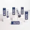 Several tubes and boxes of hair dye are arranged on a white surface. Náhled obrázku produktu