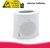 A white electronic device with a warning sticker and text overlay. Anteprima dell’immagine prodotto