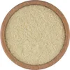 A close-up, top-down view of almond flour in a wooden bowl. Podgląd zdjęcia produktu