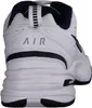 The back view of a white Nike Air Monarch IV sneaker with navy accents. Náhled obrázku produktu