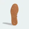The sole of a sneaker is shown against a white background. Produktbild-Vorschau