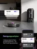 A robot vacuum cleaner is shown on a floor, with app notifications displayed on a phone and a pop-up window. Produktbild-Vorschau