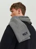 A man wearing a scarf. Anteprima dell’immagine prodotto