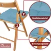 A close-up view of a light blue seat cushion on a wooden folding chair, with callouts highlighting features. Produktbild-Vorschau