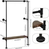 A diagram showing the dimensions of a black metal pipe clothing rack with a wooden shelf. Produktbild-Vorschau