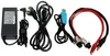 A collection of electronic accessories, including a power adapter, cables, and a USB adapter, laid out on a white background. Náhled obrázku produktu