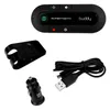 A collection of SuperTooth Buddy Bluetooth hands-free car kit accessories, including the main device, a visor clip, a car charger, and a USB cable, laid out on a white background. Podgląd zdjęcia produktu