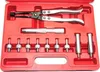 A red plastic case containing a set of automotive tools, including pliers and various adapters. Anteprima dell’immagine prodotto