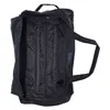 An open black duffel bag with a patterned interior. Produktbild-Vorschau