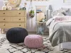 A cozy bedroom scene with a bed, dresser, and decorative items. Náhled obrázku produktu