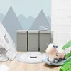 A children's room with a teepee, storage bins, a rug, and a rocking horse. Produktbild-Vorschau