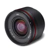 A studio shot of a camera lens against a white background. Voir les images du produit