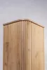 A close-up view of the top corner of a wooden cabinet. Podgląd zdjęcia produktu