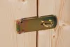 A close-up of a metal latch on a wooden door. Produktbild-Vorschau