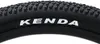A close-up of a bicycle tire with the brand name visible. Voir les images du produit