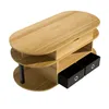 A modern wooden coffee table with black fabric drawers, shown from a top-down angle against a white background. Produktbild-Vorschau