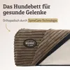 A close-up view of a dog bed with a corduroy cover and a zipper, featuring a brand logo and text highlighting its orthopedic features. Produktbild-Vorschau