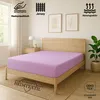 A bed with a purple fitted sheet on it, in a bedroom setting with a nightstand, lamp, and artwork on the wall. Produktbild-Vorschau