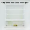 A white sheer Roman blind hangs on a window, with a small pot of sunflowers on the windowsill below. Produktbild-Vorschau