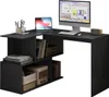 A black L-shaped desk with shelves, a laptop, a desktop monitor, keyboard, mouse, and a speaker. Produktbild-Vorschau
