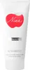 A white tube of Nina Ricci Nina Creamy Body Lotion with a red apple logo. Náhľad obrázku produktu