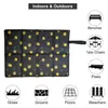 A folded outdoor seat cushion with a lemon pattern, surrounded by icons and text indicating its uses. Produktbild-Vorschau