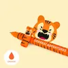 A close-up marketing shot of an orange gel pen with a tiger design, featuring the text 'GRRRREAT ADVENTURES'. Náhľad obrázku produktu