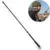 A handheld antenna is shown in the foreground, with a person using a radio in the background inset. Podgląd zdjęcia produktu