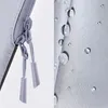 A close-up view of a light gray fabric with water droplets on it, and a close-up of a zipper with two pull tabs. Náhľad obrázku produktu