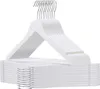 A stack of white wooden hangers. Produktbild-Vorschau