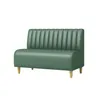 A green sofa with a fluted backrest and wooden legs, isolated on a white background. Produktbild-Vorschau