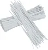 A pile of white twist ties. Produktbild-Vorschau
