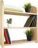 A three-tiered wooden shelf unit with books and plants. Voir les images du produit