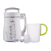 A white appliance with floral designs, a mug, and a small cup on a white background. Produktbild-Vorschau