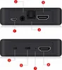 The back and bottom views of a black audio converter device. Voir les images du produit
