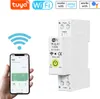 A hand holding a smartphone displaying an energy monitoring app next to a smart circuit breaker. Podgląd zdjęcia produktu