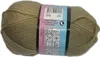 A ball of beige yarn with a label showing product information and care instructions. Podgląd zdjęcia produktu