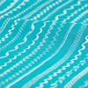 A close-up view of various decorative stitches on turquoise fabric. Produktbild-Vorschau