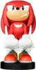 A figurine of the character Knuckles from Sonic the Hedgehog, standing on a black base. Podgląd zdjęcia produktu