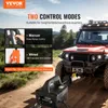 A winch and a red off-road vehicle on a dirt path. Anteprima dell’immagine prodotto