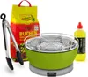 A set of barbecue accessories including a green table grill, a bag of charcoal, tongs, and a bottle of lighter fluid, arranged on a white background. Produktbild-Vorschau