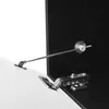 Close-up view of cabinet hinges and a support rod on a white and black surface. Anteprima dell’immagine prodotto
