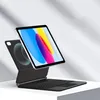 A tablet with a keyboard case is displayed on a white surface with shadows cast from above. Podgląd zdjęcia produktu