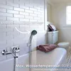 A bathroom scene showing a bathtub faucet with a hand shower, a toilet, and towels. Produktbild-Vorschau