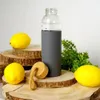 Butelka szklana z silikonową osłoną i drewnianym korkiem do Podgląd zdjęcia produktu 6