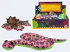 A collection of plush toy animals, including a snake and a scorpion-like creature, displayed with a colorful product box. Produktbild-Vorschau
