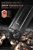 A black phone case with a kickstand is shown in a dramatic, rocky environment, suggesting durability and protection. Produktbild-Vorschau