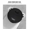 A black robot vacuum cleaner with side brushes is shown from a top-down diagonal angle on a marble-like surface. Náhled obrázku produktu